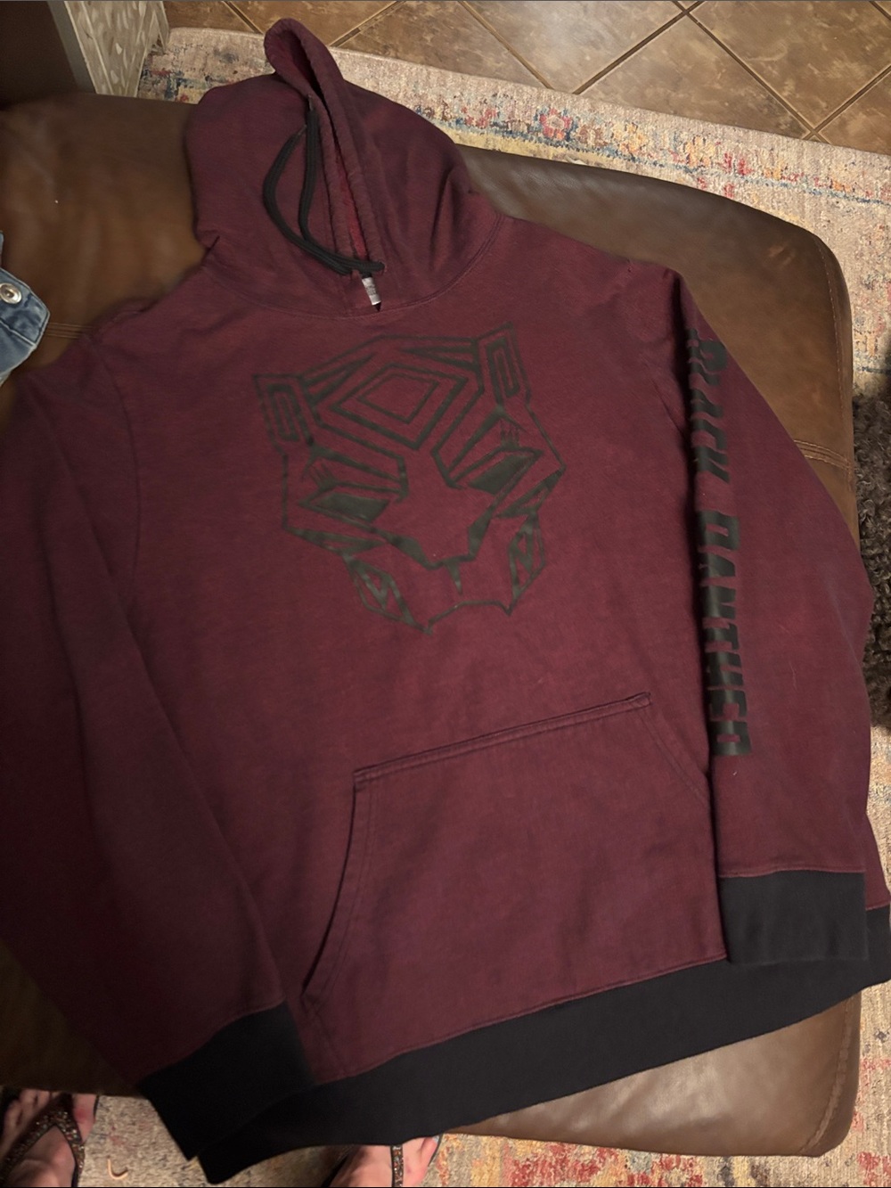 Black Panther Maroon Pullover Hoodie with Graphic Panther Emblem.